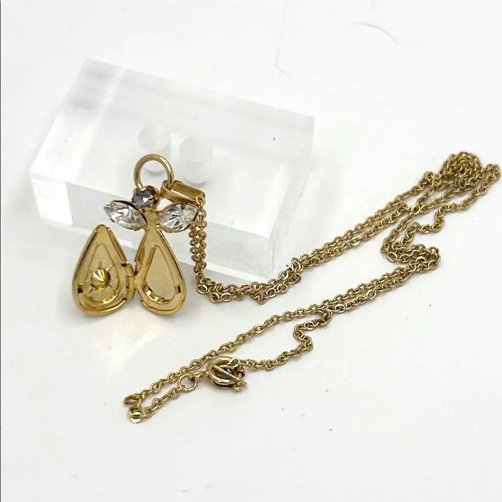 Vintage gold tone angel pendant locket birthstone necklace - purple rhinestone